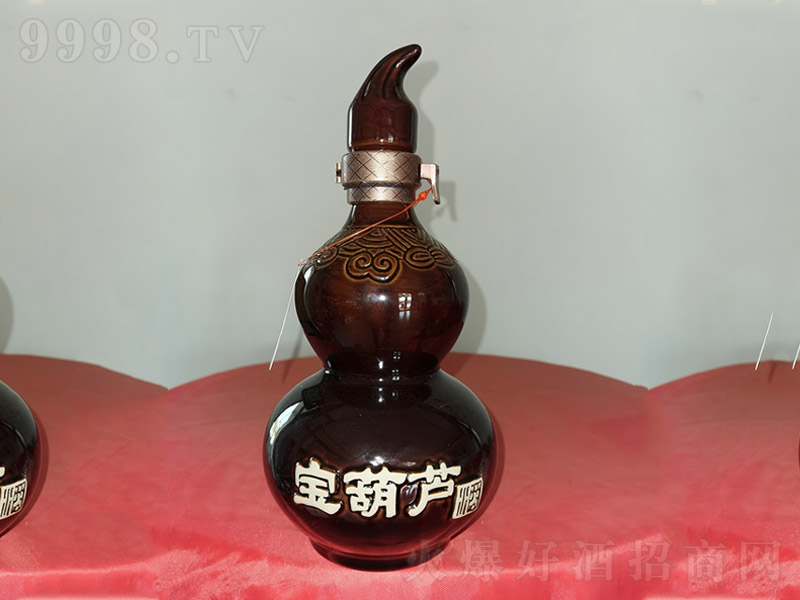 �����J��